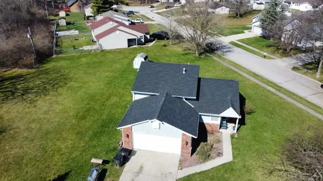 Completed architectural shingle roof from Big Dog Roofing's project gallery