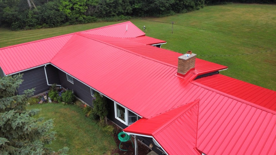 Completed standing seam metal roof installed by Big Dog Roofing in Northeast Indiana