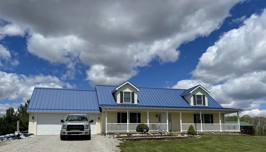 Blue standing-seam metal roof from Big Dog Roofing's project gallery